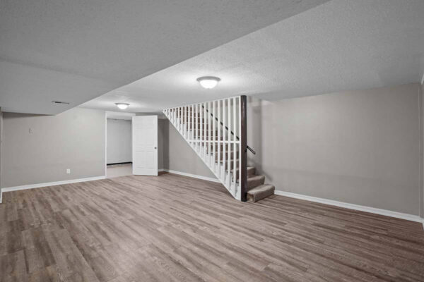 my-lp-woodflooring spacious open area with stairs