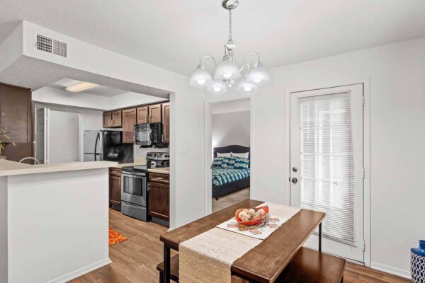 sw-lp-dining Kitchen and dining area with bedroom entrance