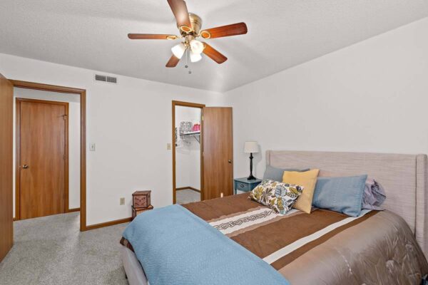 vw-lp-bedroom bedroom with attached walk-in closet