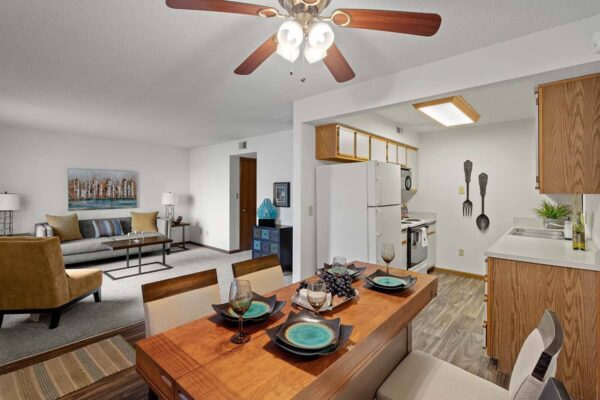 vw-lp-dining kitchen with wood plank flooring at attached living room